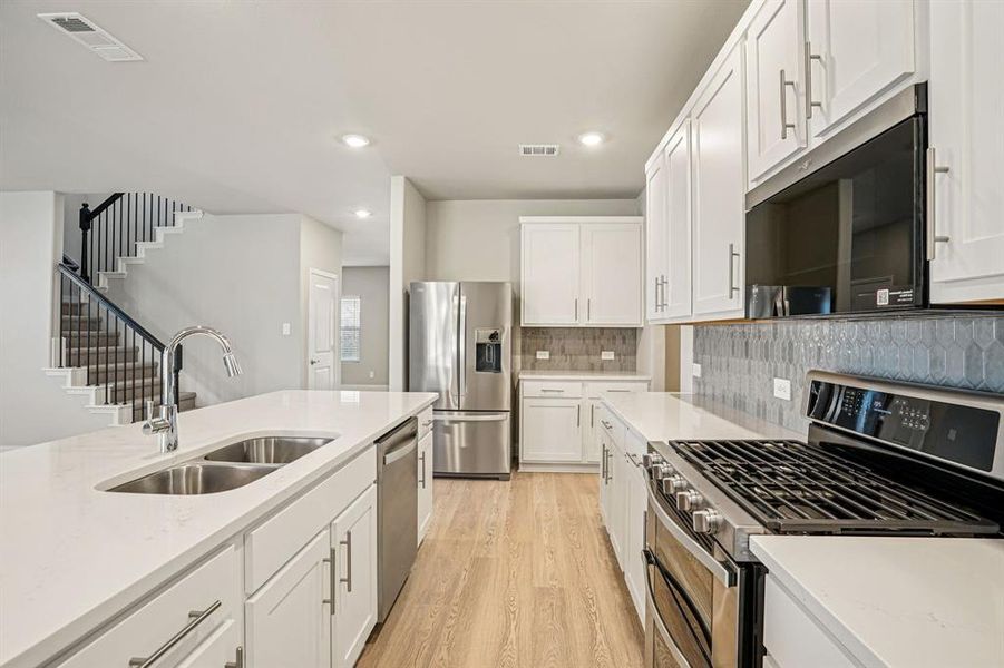 Photo is not of the actual home, but is an inspirational photo of builder’s model home and may depict options, furnishings, and/or decorator features that are not included.