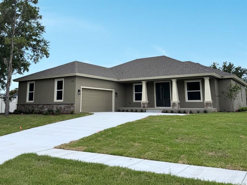 Front exterior of a new home in , Bartow, FL, highlighting curb appeal (Image 5). Front exterior of a new home in , Bartow, FL, highlighting curb appeal (Image 5).