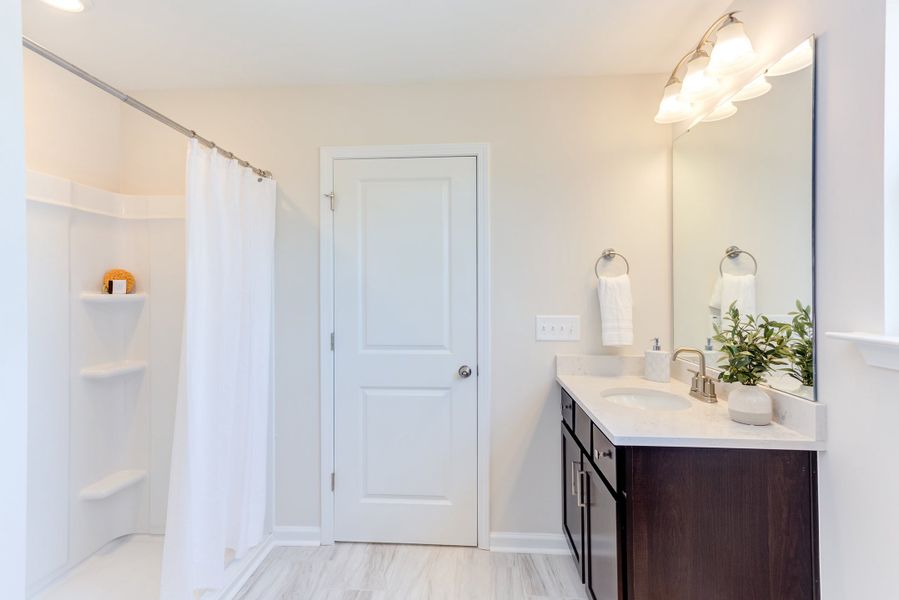 Representative furnished interior of a home built from the The Poppy by Chesapeake Homes in The Willows, Loris (Image 35).