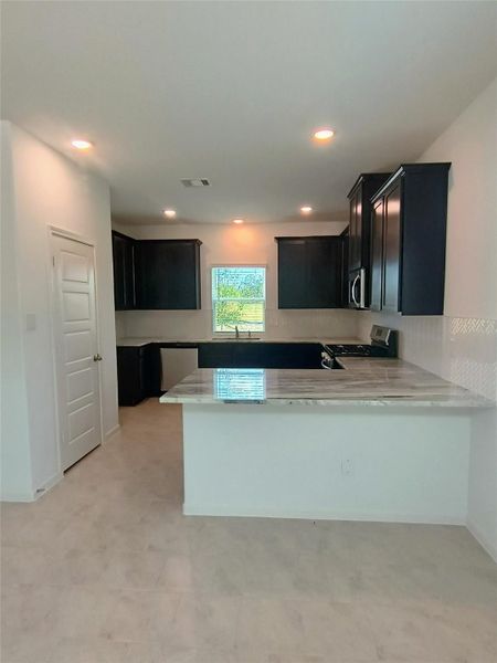 Furnished interior view inside a new home in Splendora Fields, Splendora (Image 8).