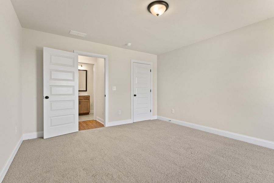 Spacious, unfurnished interior of a new home in Cherokee Knoll, Williamston (Image 20).