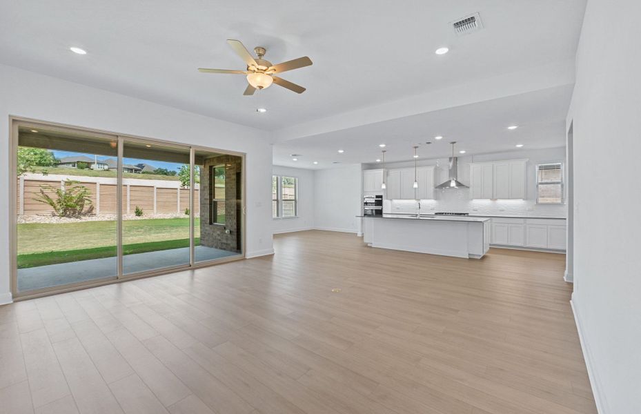 Spacious, unfurnished interior of a new home in Bluffview Reserve, Leander (Image 48).