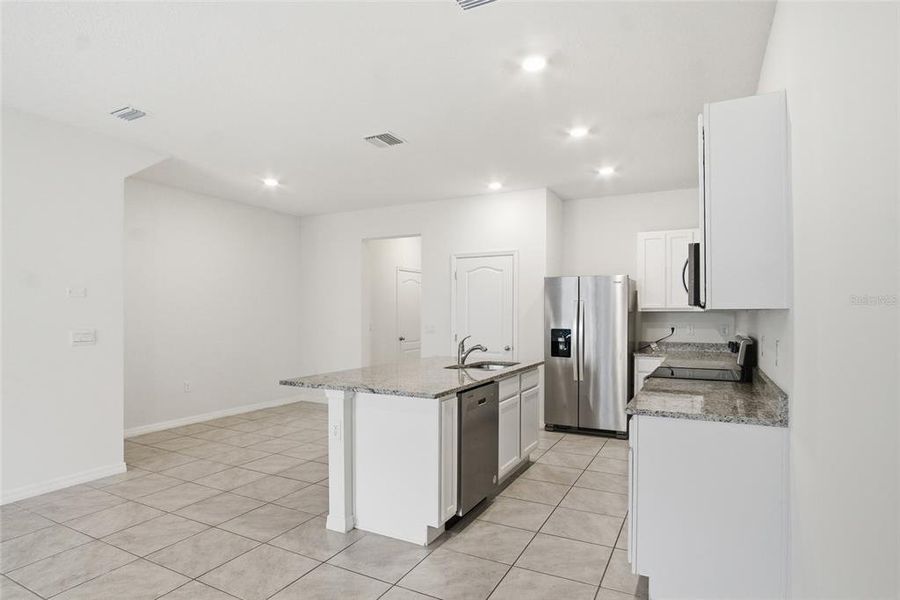 Furnished interior view inside a new home in , Davenport (Image 8).