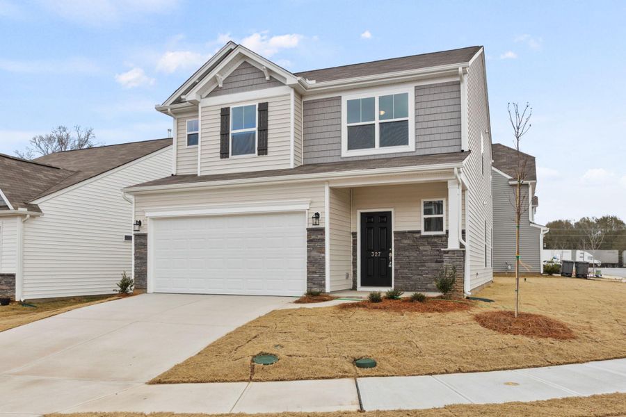 Front exterior of a new home in Bellevue, Greenville, SC, highlighting curb appeal (Image 2).