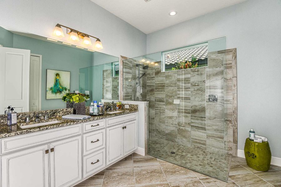 Representative furnished interior of a home built from the Endless Summer 4 by Neal Communities in Boca Royale Golf & Country Club at Wellen Park, Englewood (Image 17).