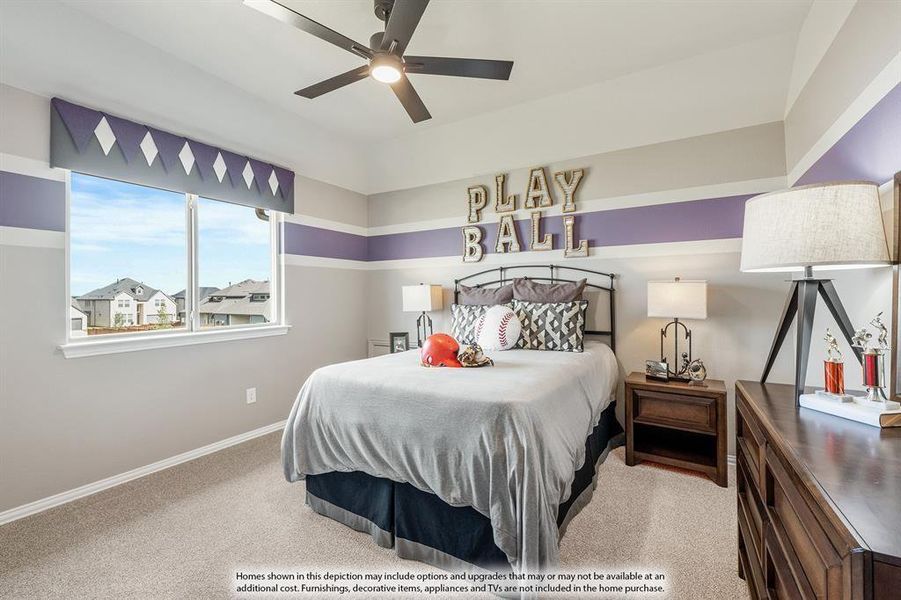 Bedroom with ceiling fan and light colored carpet