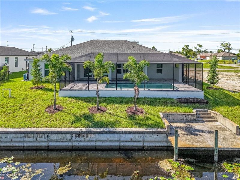 Front exterior of a new home in Cape Coral, Cape Coral, FL, highlighting curb appeal (Image 22).