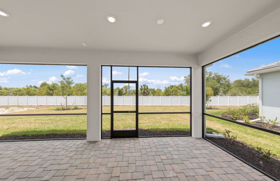 Exterior details and patio area of a home in Shores at Stillwater, Englewood (Image 23).