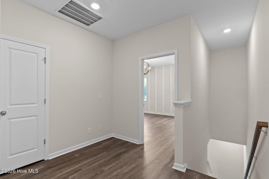 Spacious, unfurnished interior of a new home in Coastal Haven Townes, Leland (Image 22).