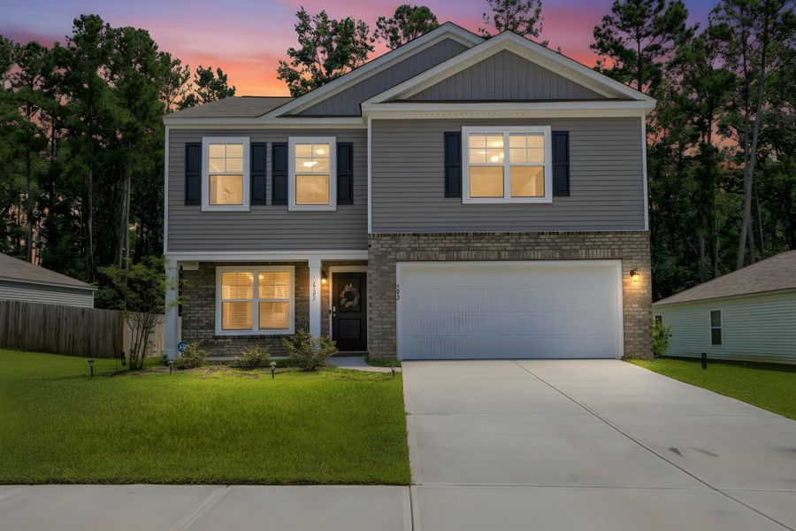 Front exterior of a new home in Stone Ridge, Moncks Corner, SC, highlighting curb appeal (Image 25).