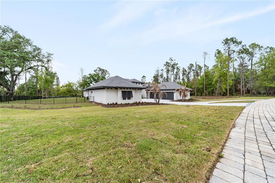 Exterior details and patio area of a home in Bella Collina, Montverde (Image 31). Exterior details and patio area of a home in Bella Collina, Montverde (Image 31).