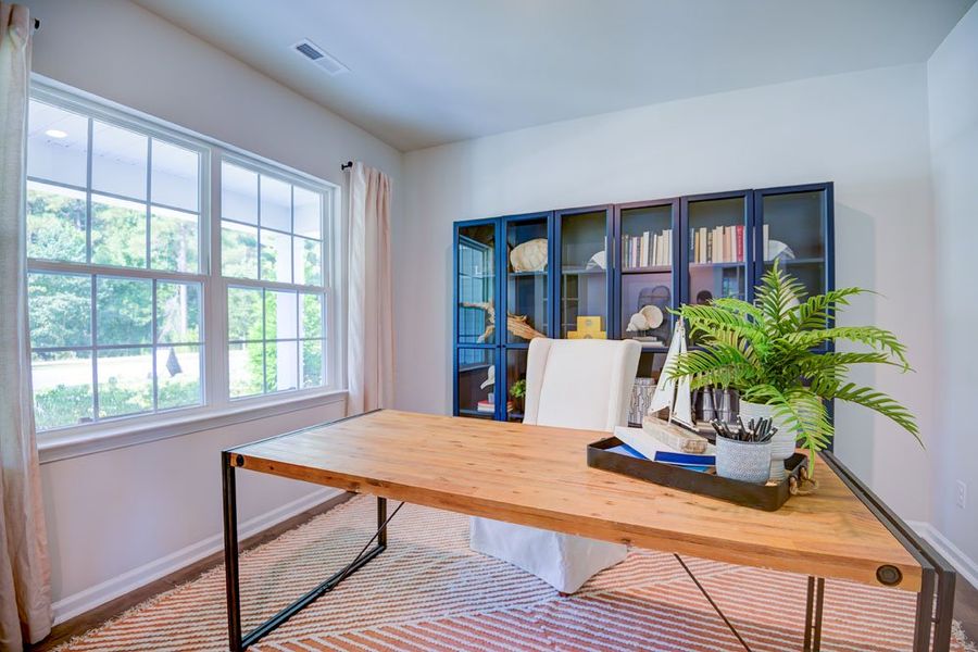 Representative furnished interior of a home built from the PENWELL by D.R. Horton in West New Bern, New Bern (Image 4).