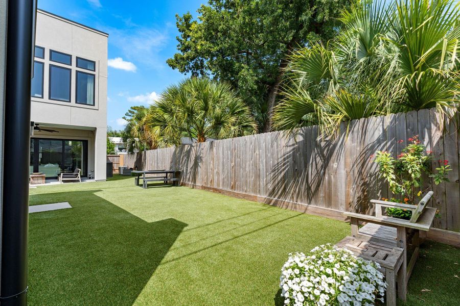 The spacious turfed backyard offers plenty of room for outdoor living, play, pets, and entertaining, all friends by mature landscaping and a privacy fence.