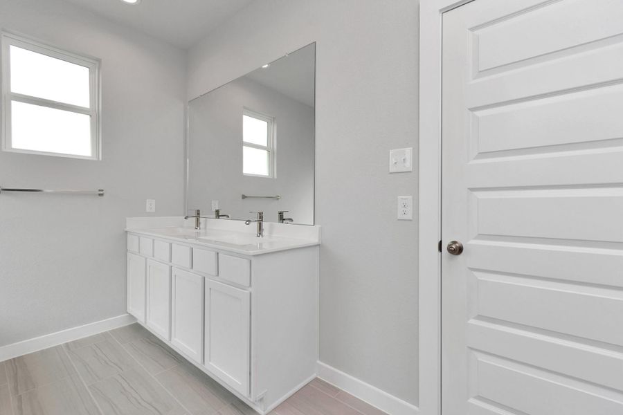 Sample photo of completed home with similar floor plan. Actual colors and selections may vary.