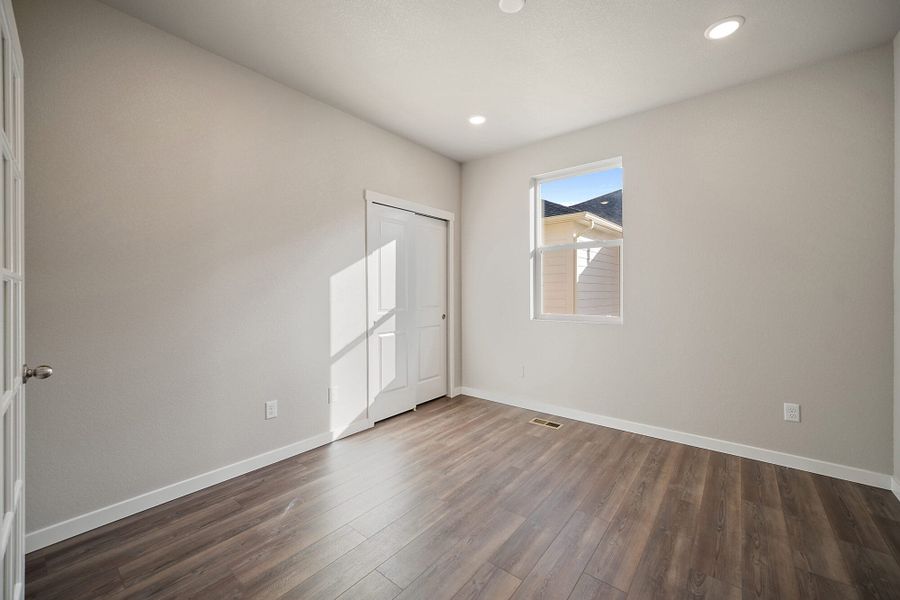 Spacious, unfurnished interior of a new home in The Glen, Colorado Springs (Image 16).