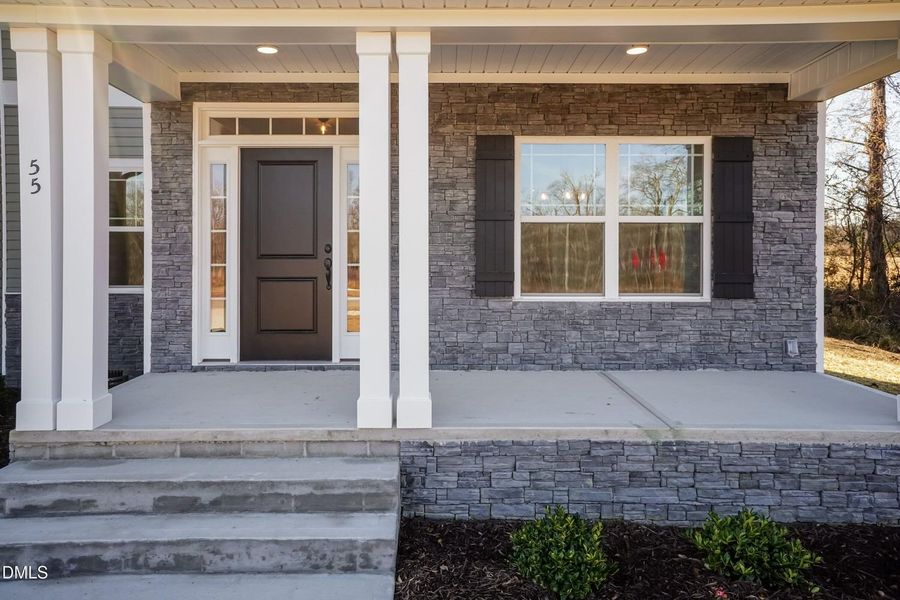 Exterior details and patio area of a home in Charlotte's Ridge, Middlesex (Image 3).