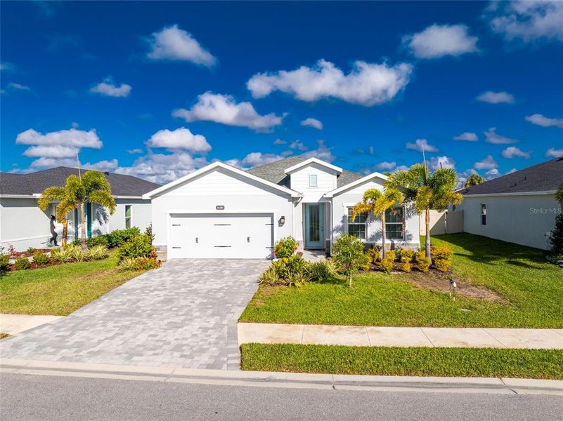 Front exterior of a new home in , Port Charlotte, FL, highlighting curb appeal (Image 26).
