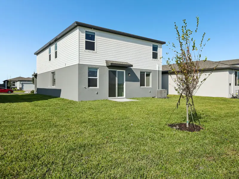 Exterior details and patio area of a home in Oakfield Trails - Premier Series, Parrish (Image 3).