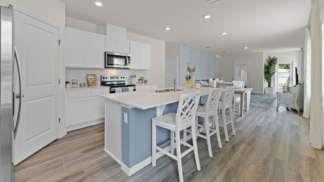 Representative furnished interior of a home built from the HARPER by D.R. Horton in Wynwood, Ocoee (Image 3).