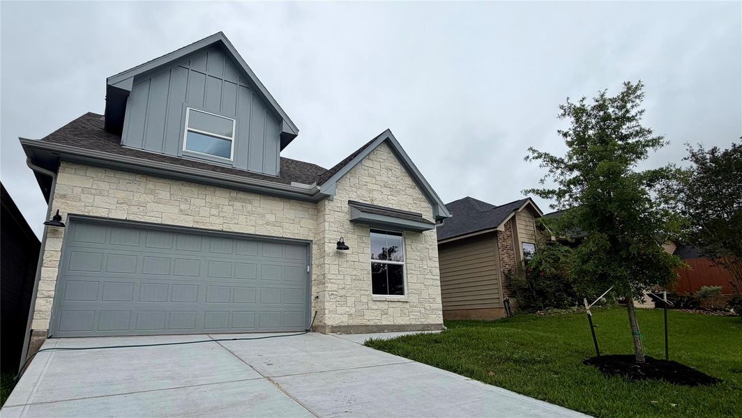 Front exterior of a new home in , Conroe, TX, highlighting curb appeal (Image 22).