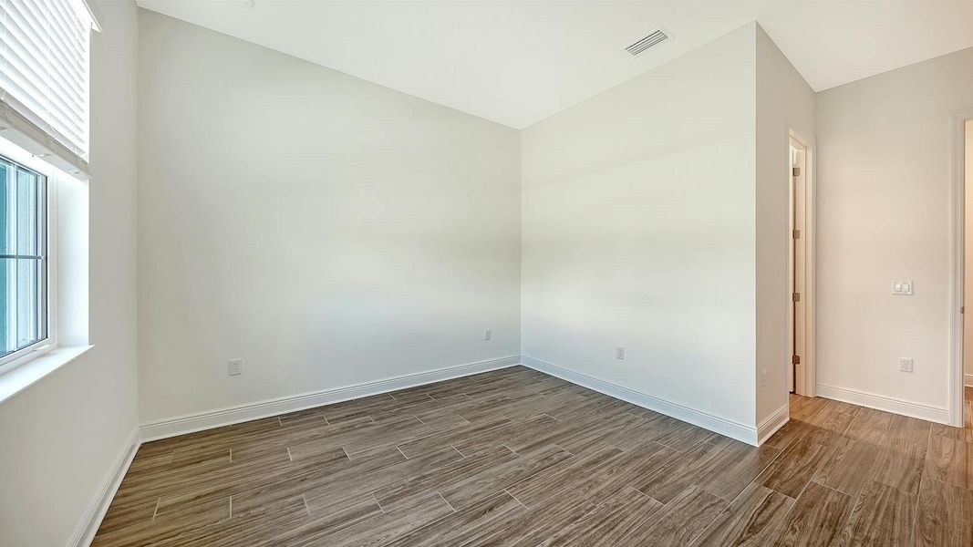 Spacious, unfurnished interior of a new home in Canoe Creek Real Estate and Homes for Sale in Parrish, FL - Neal Communities, Parrish (Image 33). Spacious, unfurnished interior of a new home in Canoe Creek Real Estate and Homes for Sale in Parrish, FL - Neal Communities, Parrish (Image 33).