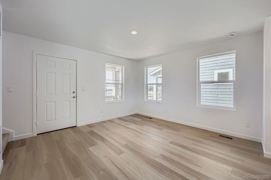 Spacious, unfurnished interior of a new home in Percheron: The Explorer Collection, Colorado Springs (Image 7).