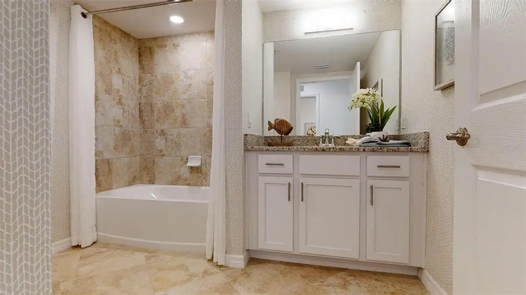 Furnished interior view inside a new home in Wellen Park Golf & Country Club, Venice (Image 13).