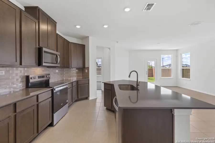Furnished interior view inside a new home in Woodside Farms, Seguin (Image 10).
