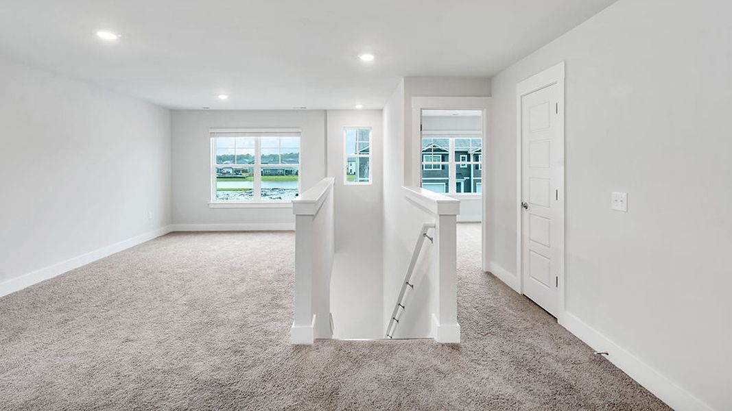 Spacious, unfurnished interior of a new home in The Landing at Sidbury Station, Castle Hayne (Image 22).