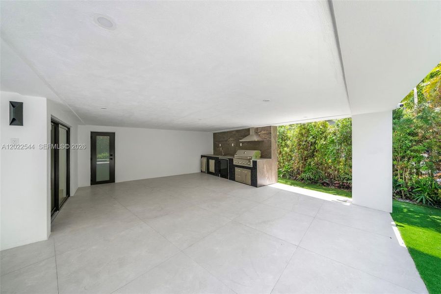 Exterior details and patio area of a home in , Miami (Image 3). Exterior details and patio area of a home in , Miami (Image 3).