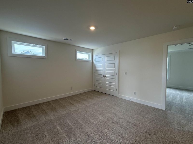 Spacious, unfurnished interior of a new home in Cottages at Roofs Pond, West Columbia (Image 35).