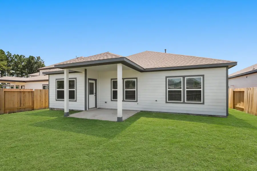 Front exterior of a new home in Magnolia Springs, Montgomery, TX, highlighting curb appeal (Image 2). Front exterior of a new home in Magnolia Springs, Montgomery, TX, highlighting curb appeal (Image 2).