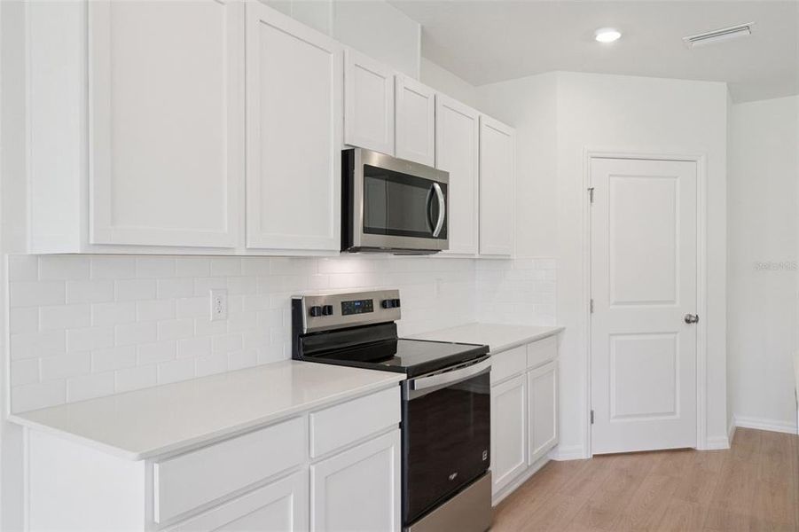 Furnished interior view inside a new home in , Daytona Beach (Image 9).