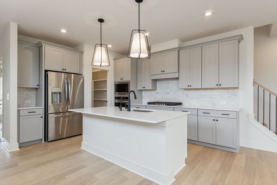 Representative furnished interior of a home built from the Lumen C by Homes by Dickerson in Chatham Park, Pittsboro (Image 7).
