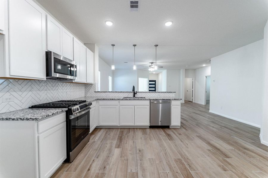 Furnished interior view inside a new home in Cielo, Conroe (Image 2).