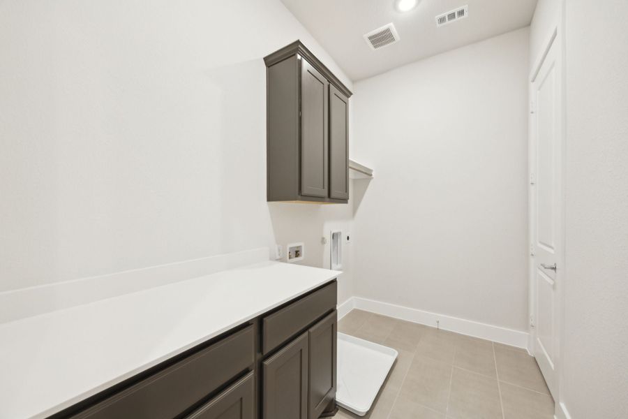 Furnished interior view inside a new home in Newman Village Townhomes, Frisco (Image 10).