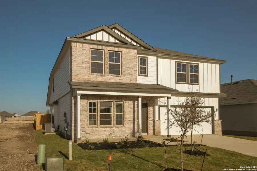 Front exterior of a new home in Winding Brook, San Antonio, TX, highlighting curb appeal (Image 1). Front exterior of a new home in Winding Brook, San Antonio, TX, highlighting curb appeal (Image 1).