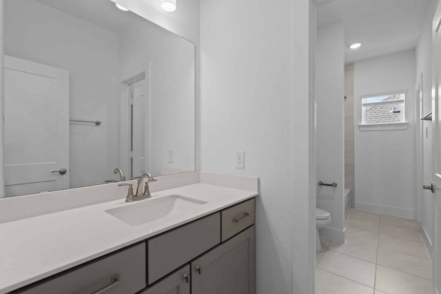 Furnished interior view inside a new home in Wood Leaf Reserve, Tomball (Image 12).