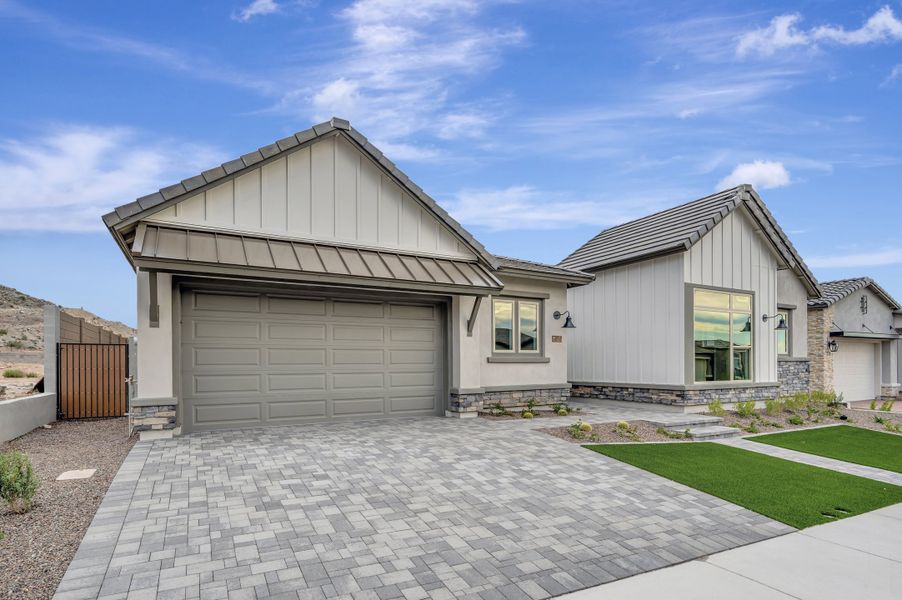Front exterior of a new home in The Ridge at Victory, Litchfield Park, AZ, highlighting curb appeal (Image 25). Front exterior of a new home in The Ridge at Victory, Litchfield Park, AZ, highlighting curb appeal (Image 25).