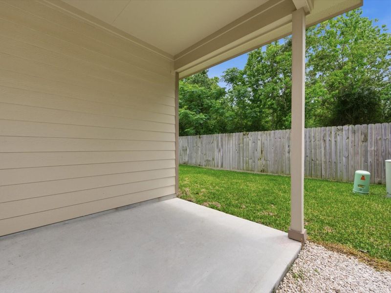 Enjoy outdoor living with a covered back patio that extends your living space and creates the perfect setting for relaxing or entertaining.