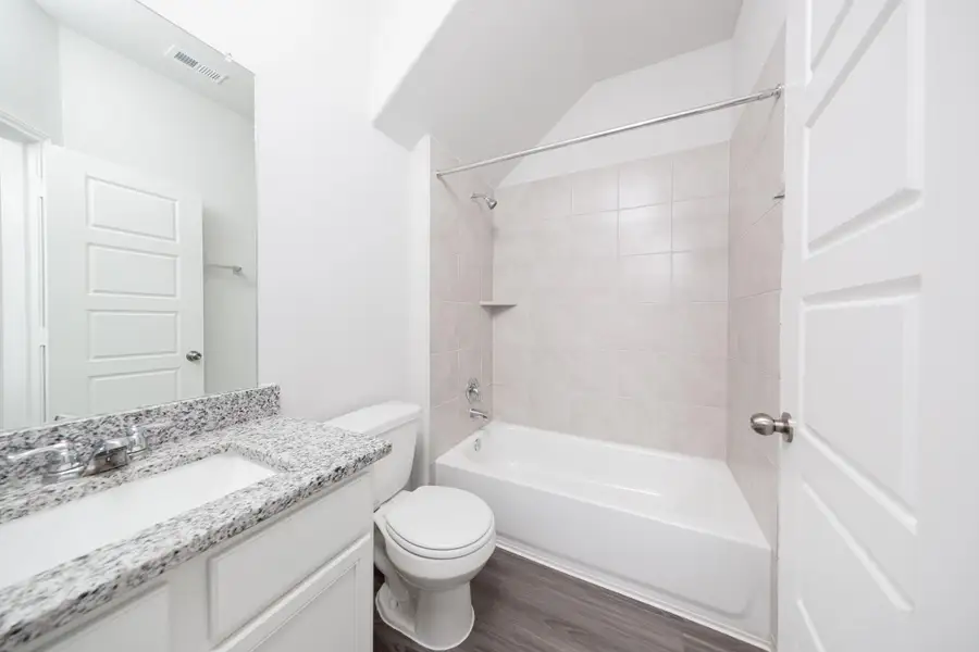 Furnished interior view inside a new home in Granger Pines, Conroe (Image 5).