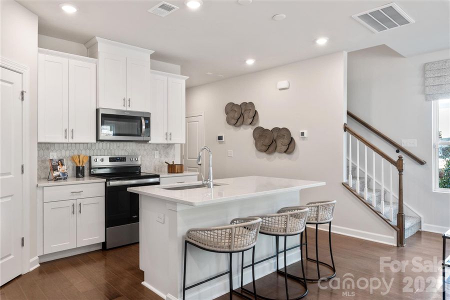 Photo is not of the actual home, but is an inspirational photo of builder’s model home and may depict options, furnishings, and/or decorator features that are not included Photo is not of the actual home, but is an inspirational photo of builder’s model home and may depict options, furnishings, and/or decorator features that are not included
