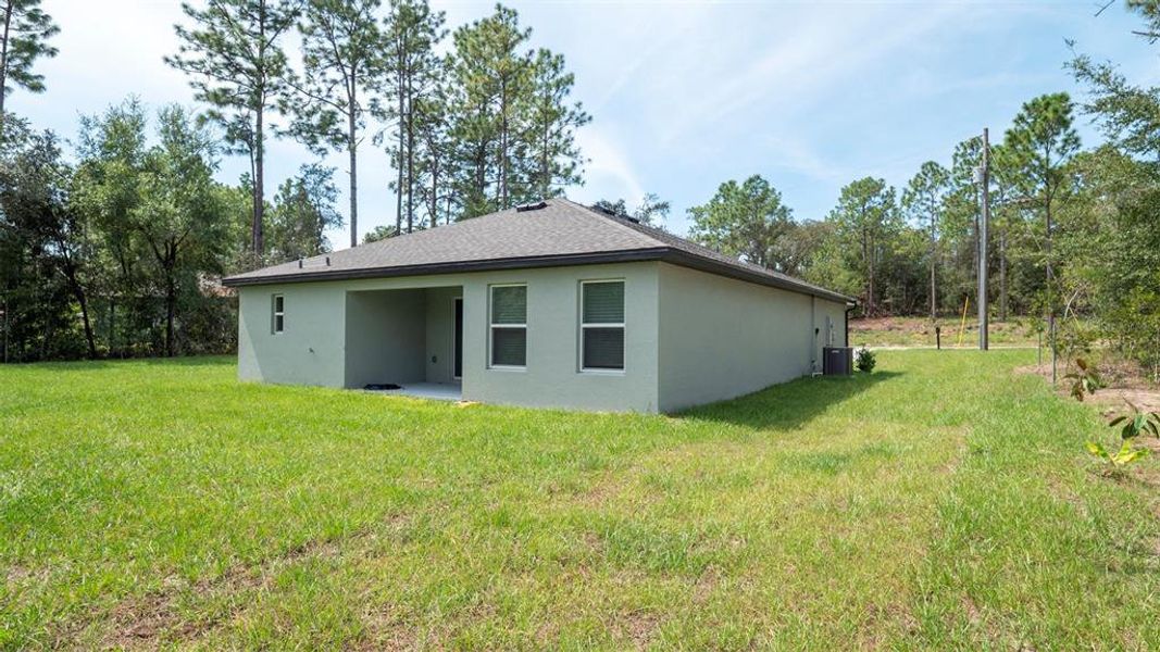 Front exterior of a new home in , Citrus Springs, FL, highlighting curb appeal (Image 1). Front exterior of a new home in , Citrus Springs, FL, highlighting curb appeal (Image 1).