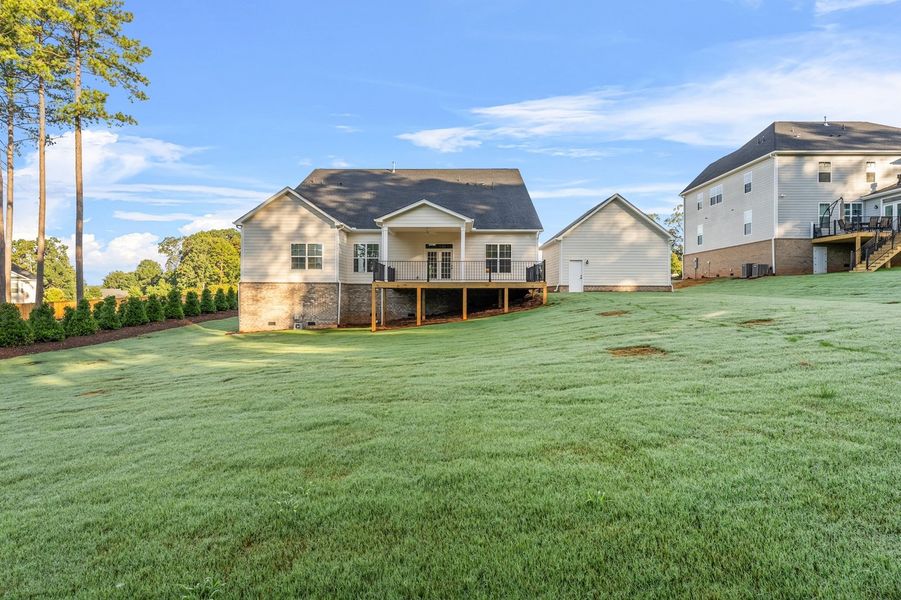 Front exterior of a new home in Suter Estates, Easley, SC, highlighting curb appeal (Image 25). Front exterior of a new home in Suter Estates, Easley, SC, highlighting curb appeal (Image 25).