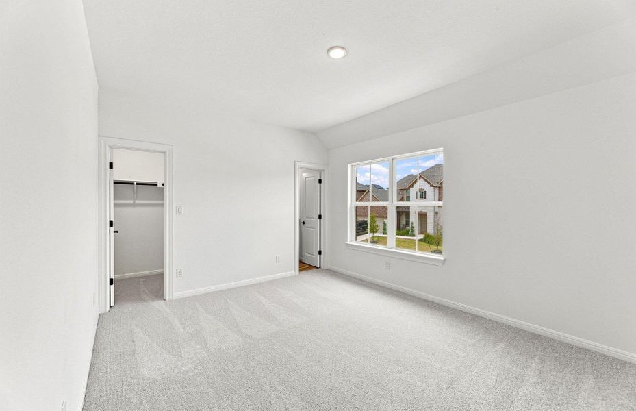 Spacious, unfurnished interior of a new home in Bluffview Reserve, Leander (Image 24).