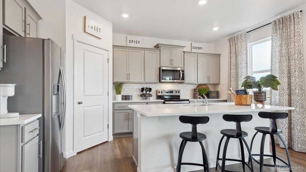 Furnished interior view inside a new home in Timberleaf, Thornton (Image 18).