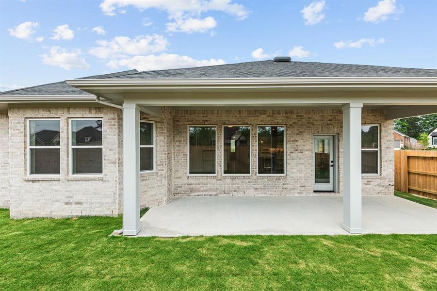 EXAMPLE PHOTO:  Big covered rear patio