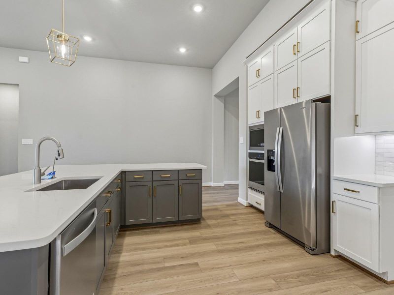 Furnished interior view inside a new home in Massey Oaks - Estate Series, Pearland (Image 6).