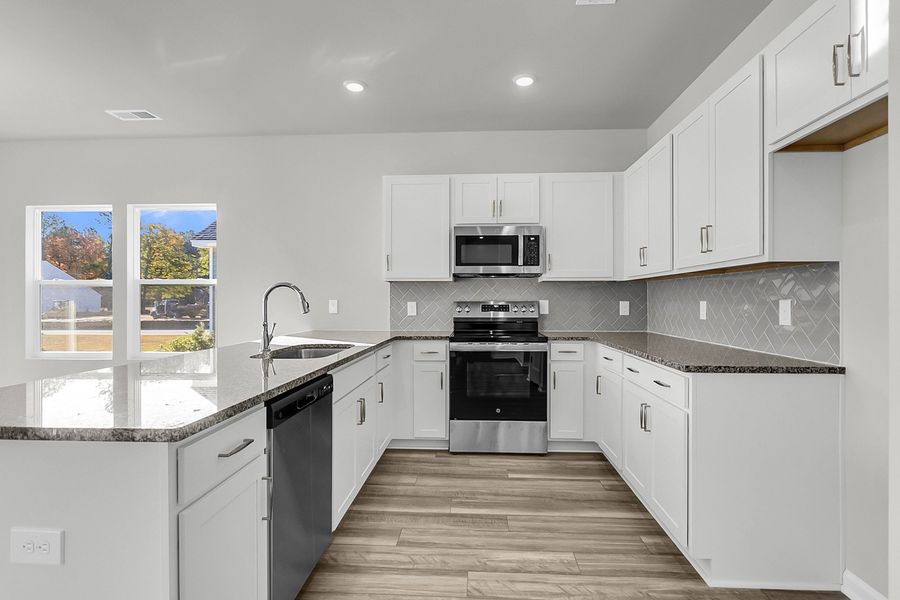Furnished interior view inside a new home in Fairway Woods at Wyboo, Manning (Image 9).