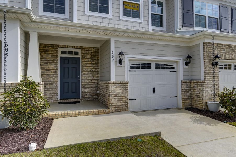 Exterior details and patio area of a home in Lake Carolina Townhomes, Columbia (Image 3).